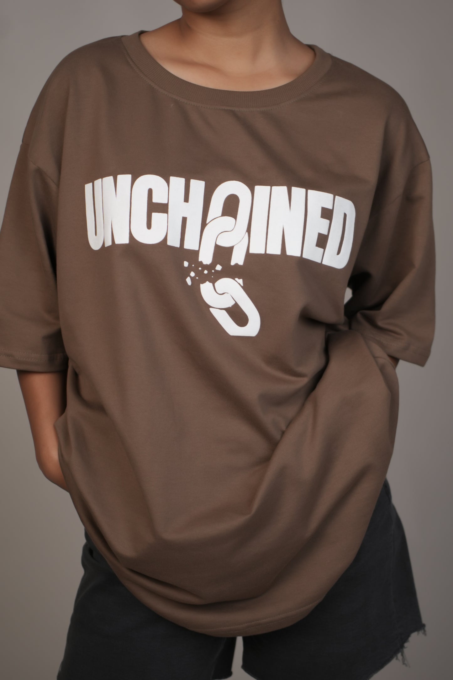 UNCHAINED Brown Oversized T-Shirt